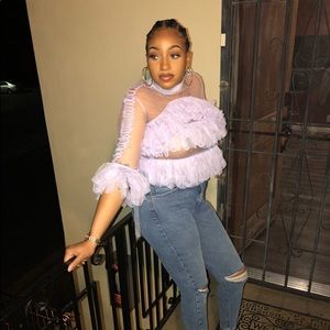 See through frilly blouse!